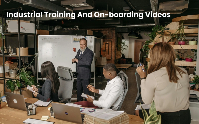 Videographer capturing an industrial training and on-boarding session in a modern office setting, emphasizing videography and digital marketing in Mumbai.